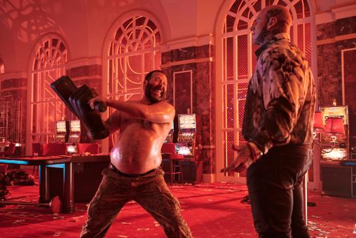 Bert (Bert Kreischer) and Sponge (Martyn Ford) in Screen Gems’ THE MACHINE.