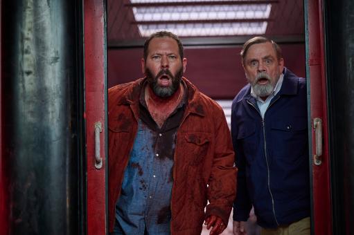 (L to R) Albert (Mark Hamill) and Bert (Bert Kreischer) in Screen Gems’ THE MACHINE.