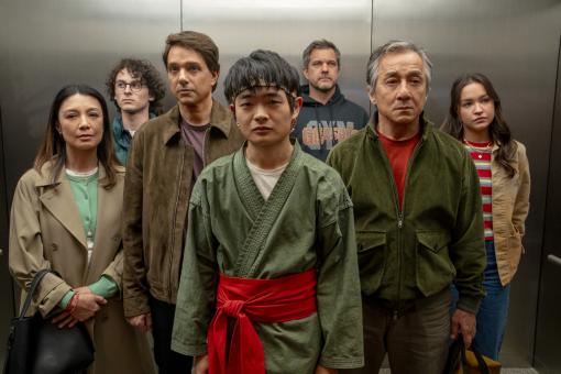 (L-R) Ming Na Wen, Wyatt Oleff, Ralph Macchio, Ben Wang, Joshua Jackson, Jackie Chan & Sadie Stanley in Sony Pictures' KARATE KID: LEGENDS © 2024 CTMG, Inc. All Rights Reserved.